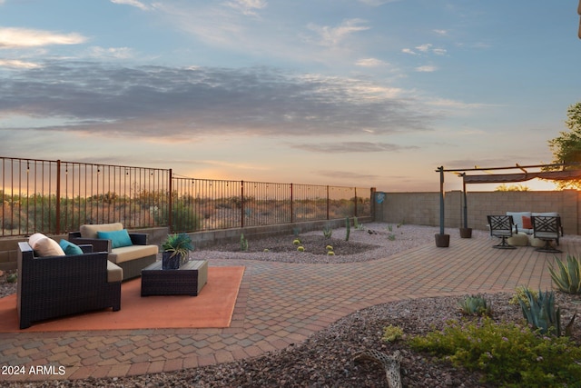 view of patio featuring outdoor lounge area and a fenced backyard