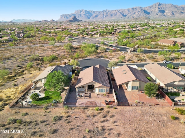 aerial perspective of suburban area with a mountain backdrop