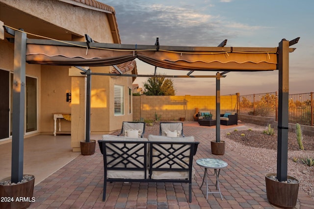 view of patio / terrace featuring an outdoor living space and a fenced backyard
