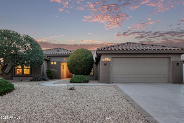 view of front of property featuring a garage