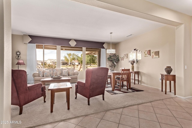 living room with light tile patterned floors