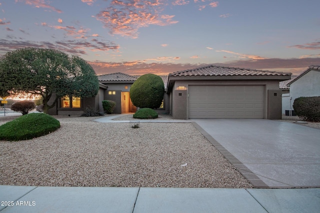 view of front of property with a garage