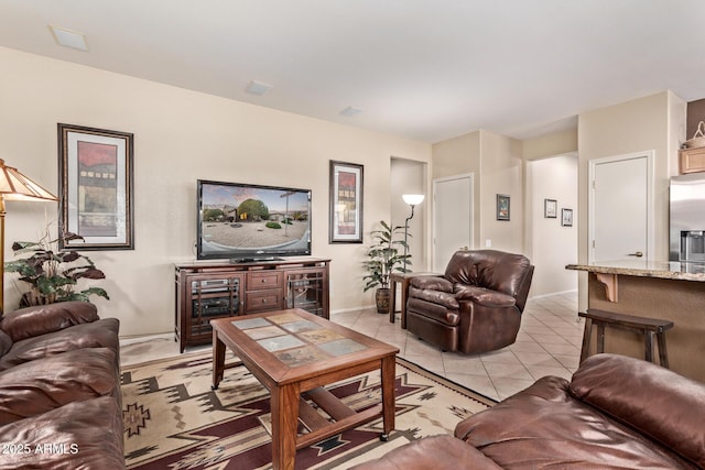 living room with light tile patterned floors