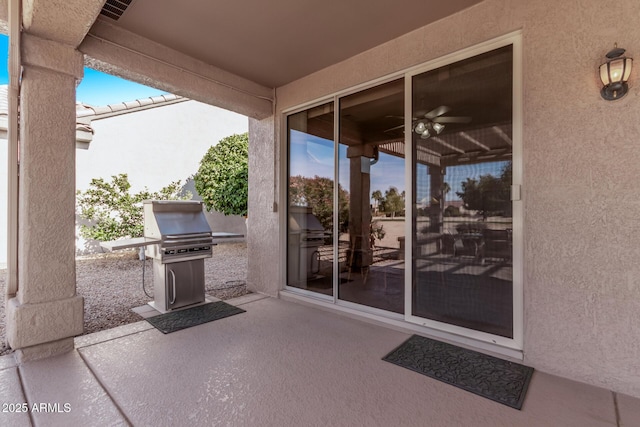 view of patio featuring a grill