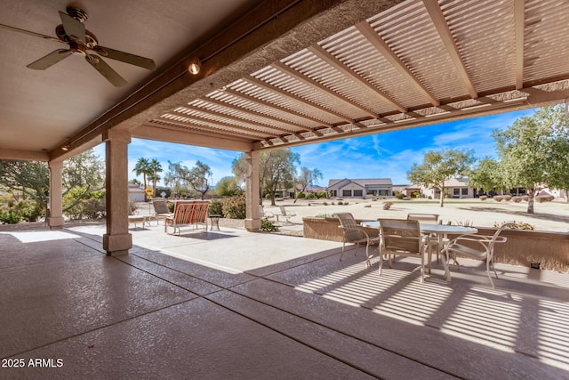 view of patio / terrace featuring a pergola and ceiling fan