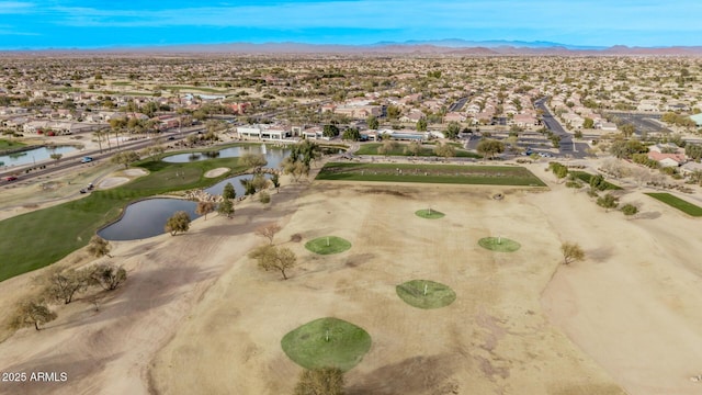 aerial view featuring a water and mountain view