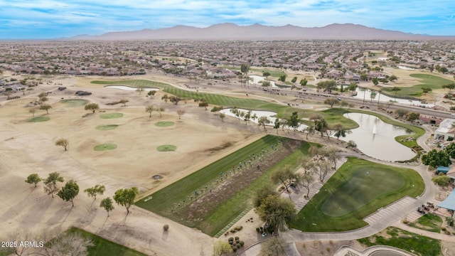 birds eye view of property featuring a water and mountain view