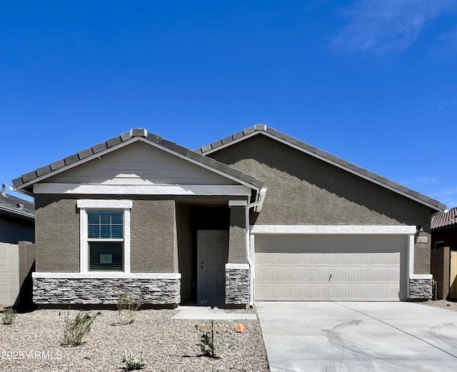 13212 E Verbina Ln, Florence, AZ 85132 - ranch-style home with an attached garage, stucco siding, stone siding, and concrete driveway