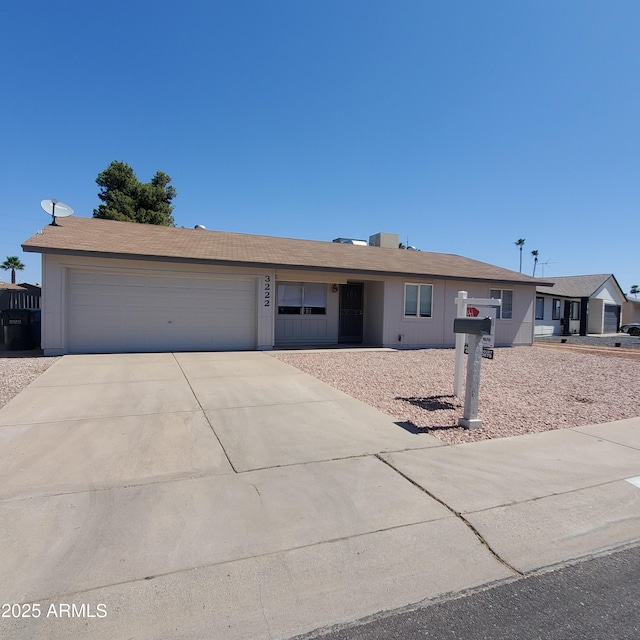 3222 W Wagoner Rd, Phoenix, AZ 85053 - ranch-style home with a garage and driveway