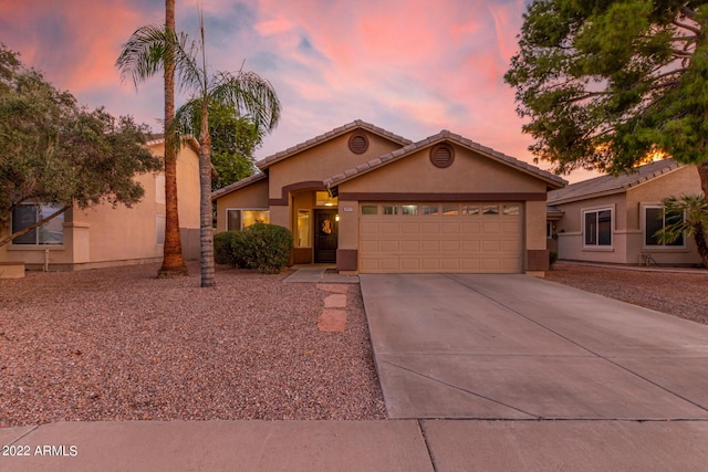 view of front of home with a garage