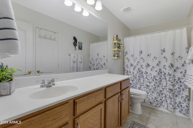 bathroom featuring curtained shower, tile patterned flooring, toilet, and vanity