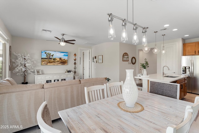 21090 N 267th Dr, Buckeye, AZ 85396 - dining area featuring a ceiling fan, visible vents, light tile patterned floors, and recessed lighting