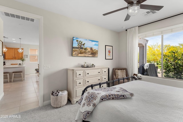 21090 N 267th Dr, Buckeye, AZ 85396 - bedroom with visible vents, baseboards, ceiling fan, and light tile patterned floors