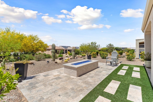 21090 N 267th Dr, Buckeye, AZ 85396 - view of patio featuring a fire pit