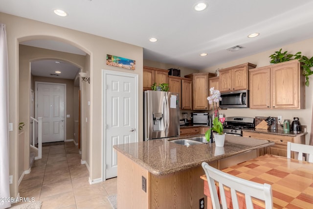 kitchen featuring light tile patterned flooring, visible vents, stainless steel appliances, and recessed lighting