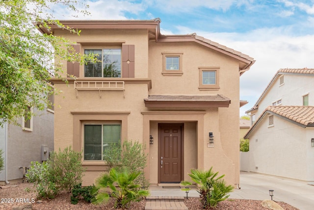 view of front of property featuring stucco siding