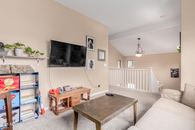 living area with carpet flooring, baseboards, and lofted ceiling