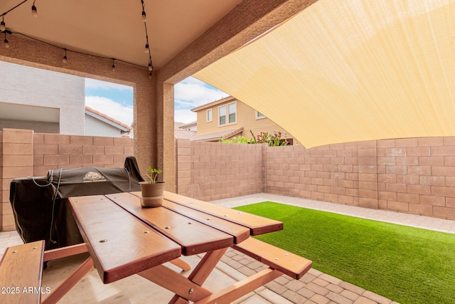 view of patio with a fenced backyard