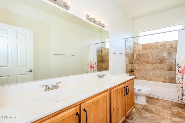 bathroom with double vanity, toilet, shower / tub combo with curtain, and a sink