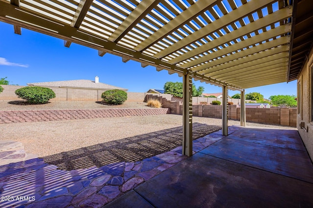 view of patio with a fenced backyard and a pergola