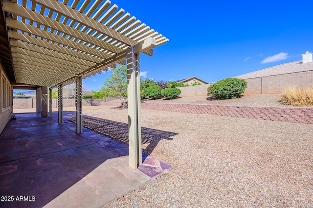 view of patio / terrace with a fenced backyard and a pergola