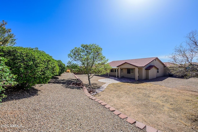 view of yard with fence and a patio area