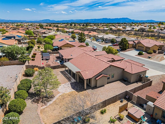 bird's eye view with a residential view and a mountain view