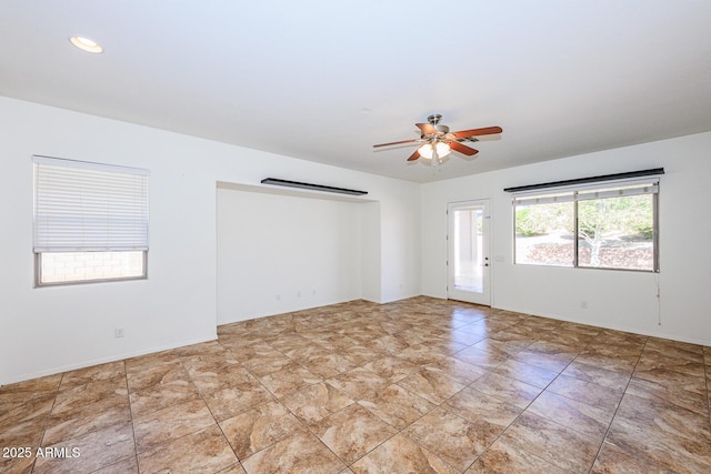 unfurnished room featuring ceiling fan and recessed lighting