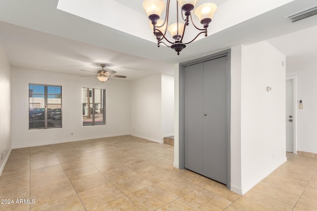 16053 N 26th Cir, Phoenix, AZ 85023 - empty room with light tile patterned flooring, baseboards, a chandelier, and ceiling fan