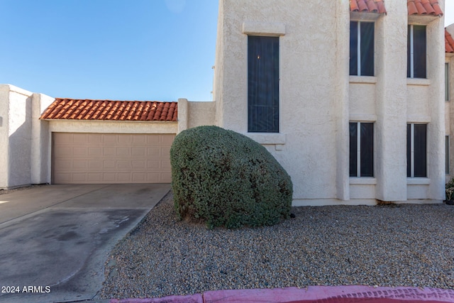 exterior space featuring a garage