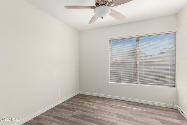 16053 N 26th Cir, Phoenix, AZ 85023 - spare room with wood finished floors, baseboards, and a ceiling fan