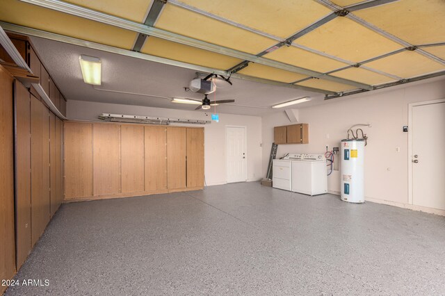 garage with water heater, washer and clothes dryer, ceiling fan, and a garage door opener