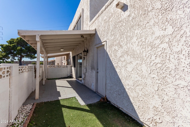 view of home's exterior with a patio