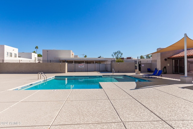 view of pool featuring a patio area