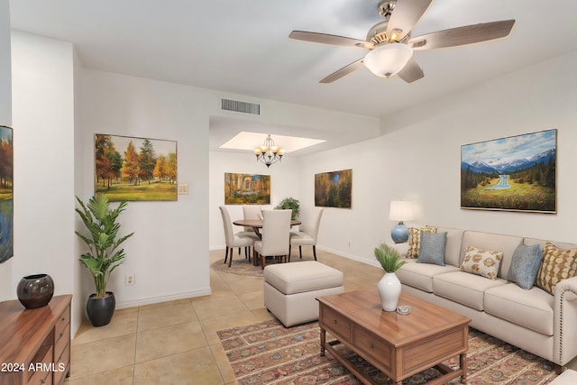 16053 N 26th Cir, Phoenix, AZ 85023 - living area with light tile patterned flooring, ceiling fan, a chandelier, and baseboards