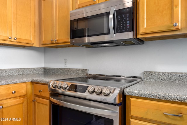 kitchen with appliances with stainless steel finishes