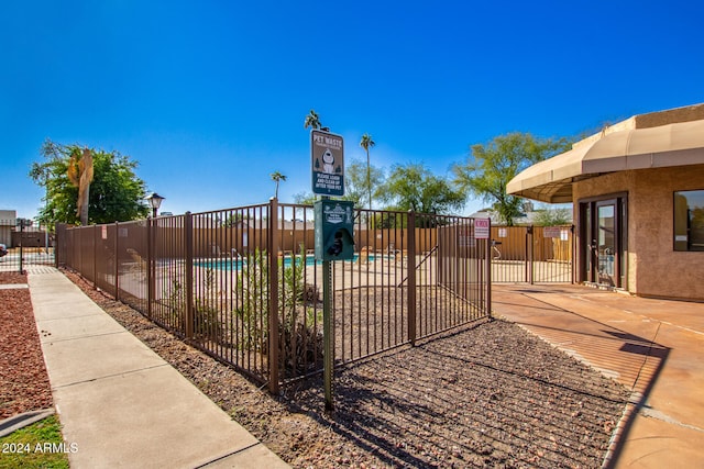 surrounding community featuring a swimming pool