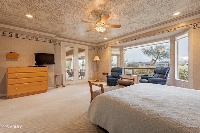 bedroom with multiple windows, ornamental molding, carpet, and access to outside