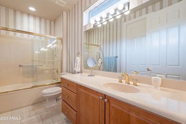 bathroom with vanity, visible vents, wallpapered walls, tile patterned floors, and toilet