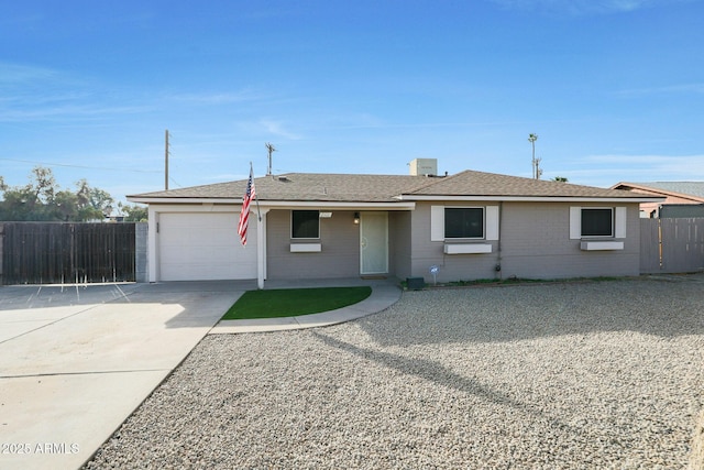 single story home with a garage