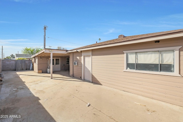 back of property featuring a patio