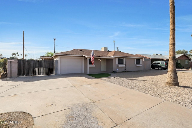 single story home with a garage