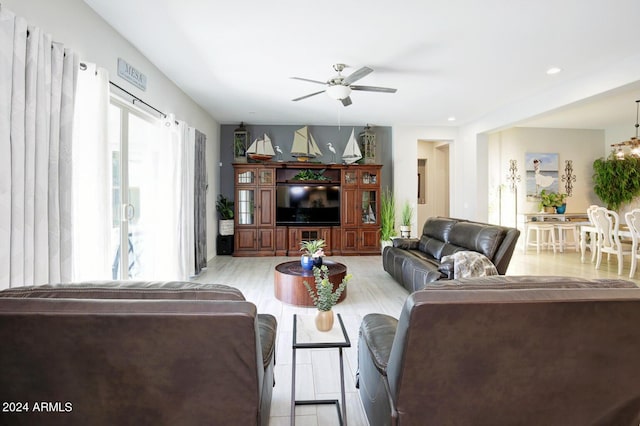 living room featuring ceiling fan