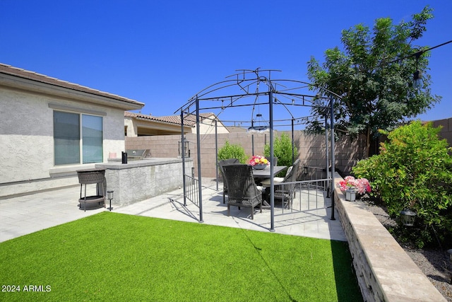 view of yard with a gazebo and a patio