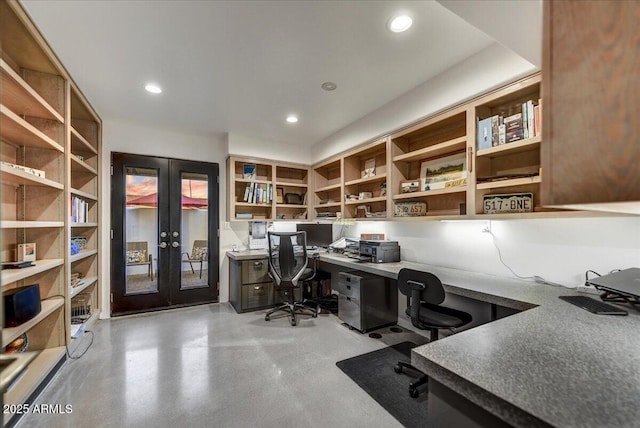 office area with recessed lighting, french doors, concrete flooring, and built in desk