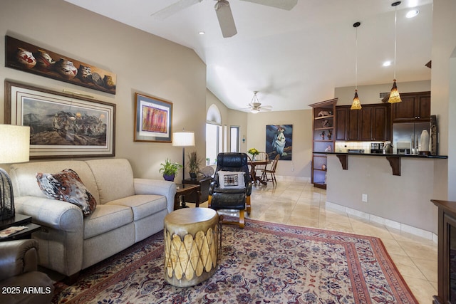 3394 N 147th Ln, Goodyear, AZ 85395 - living room with a ceiling fan, light tile patterned flooring, lofted ceiling, baseboards, and recessed lighting
