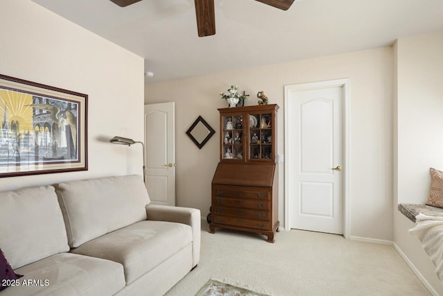 3394 N 147th Ln, Goodyear, AZ 85395 - living area with ceiling fan, light colored carpet, and baseboards
