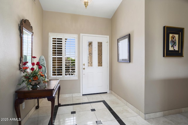 3394 N 147th Ln, Goodyear, AZ 85395 - entryway with light tile patterned floors and baseboards