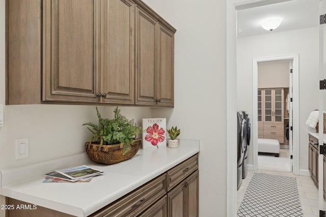 6450 E Monterra Way, Scottsdale, AZ 85266 - laundry room with washing machine and dryer and cabinet space