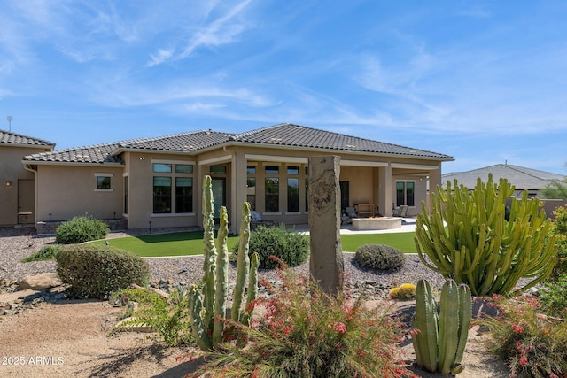 6450 E Monterra Way, Scottsdale, AZ 85266 - back of property with stucco siding, a patio area, and a tile roof